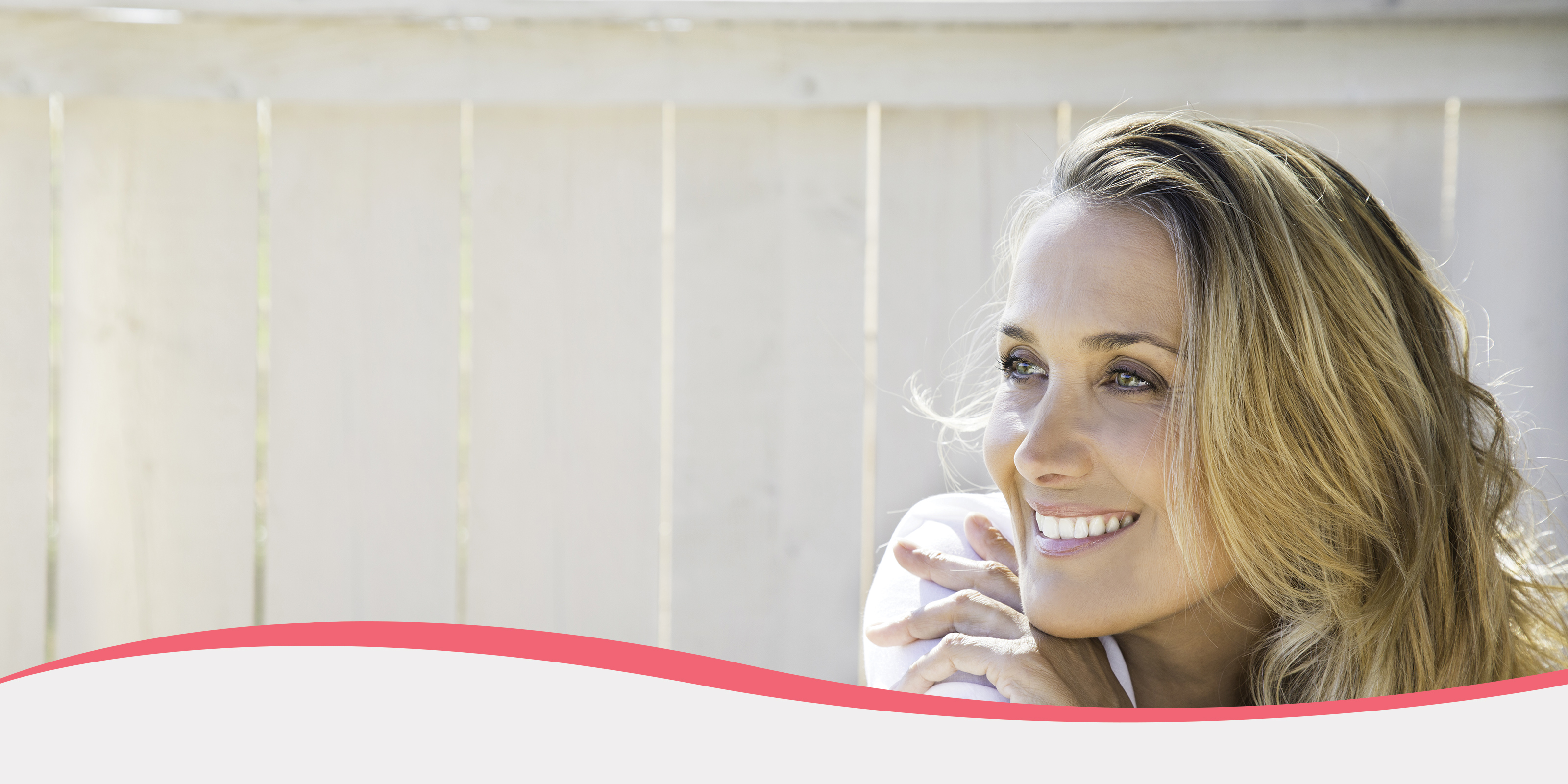 woman smiling.