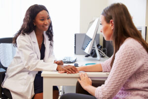 woman talking to her doctor