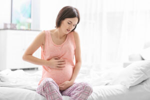 Pregnant woman with stomach pain.