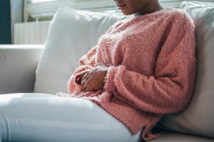 Woman with pain from fibroids. 