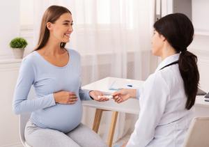Woman at her prenatal appointment. 