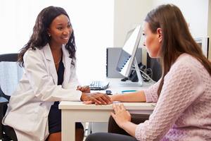 woman talking to her doctor