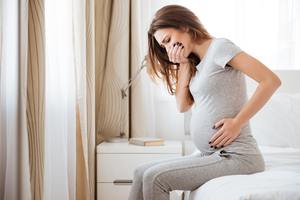 pregnant woman feeling sick