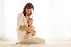 mother breastfeeding baby